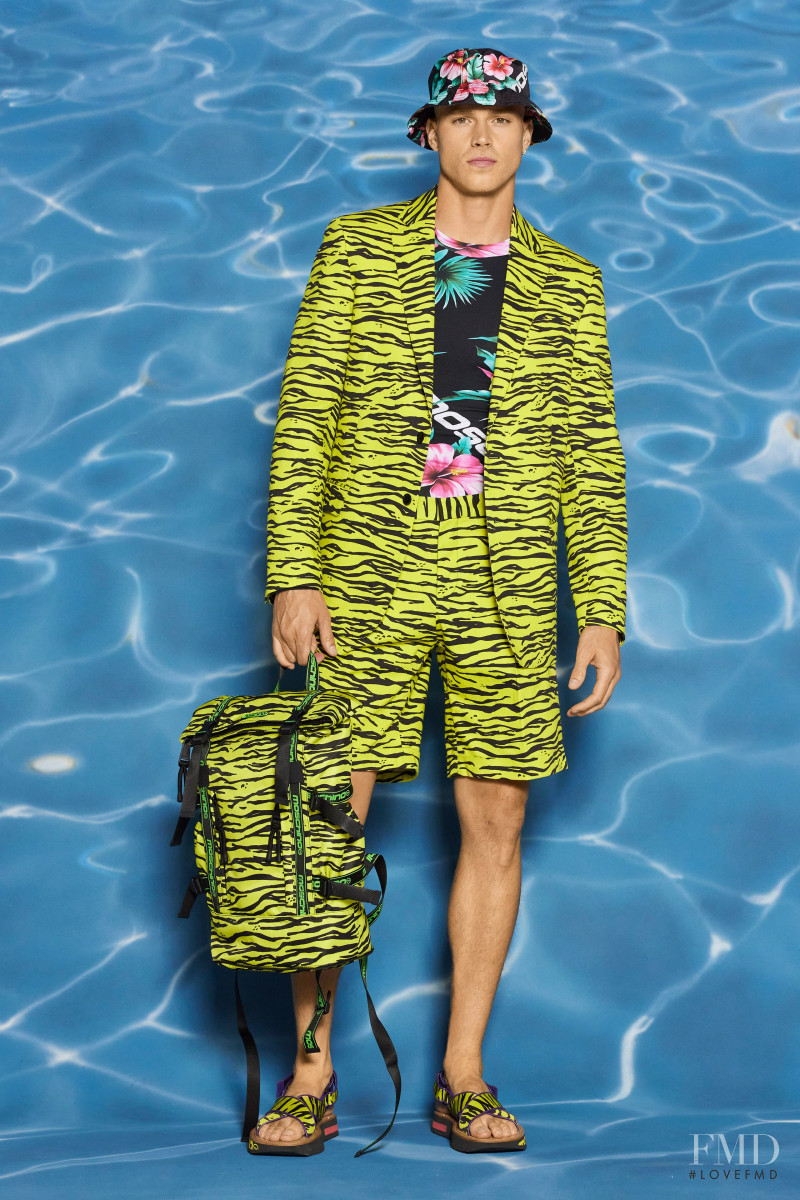 Matthew Noszka featured in  the Moschino lookbook for Resort 2022