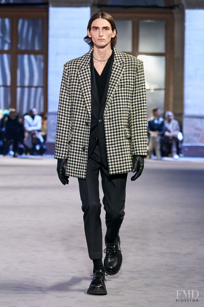 Elijah Herlocker featured in  the AMI Alexandre Mattiussi fashion show for Autumn/Winter 2022