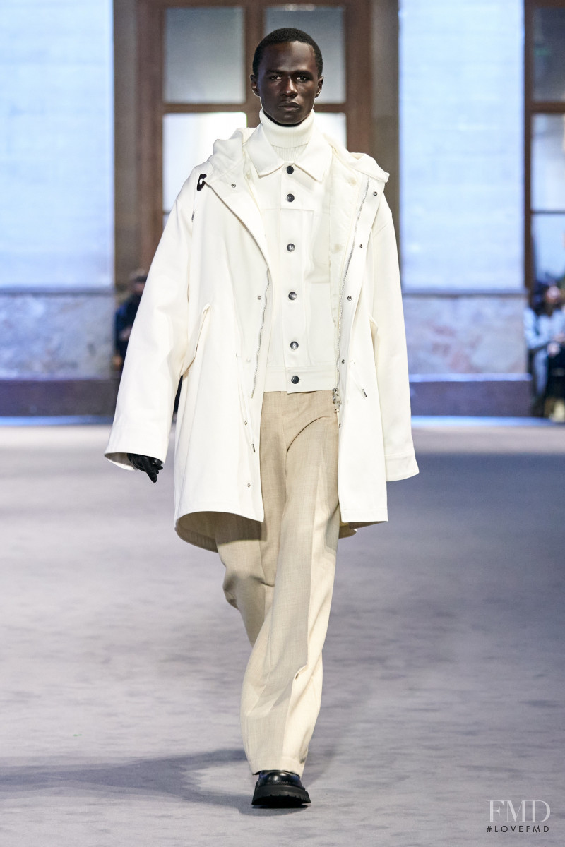 Malick Bodian featured in  the AMI Alexandre Mattiussi fashion show for Autumn/Winter 2022