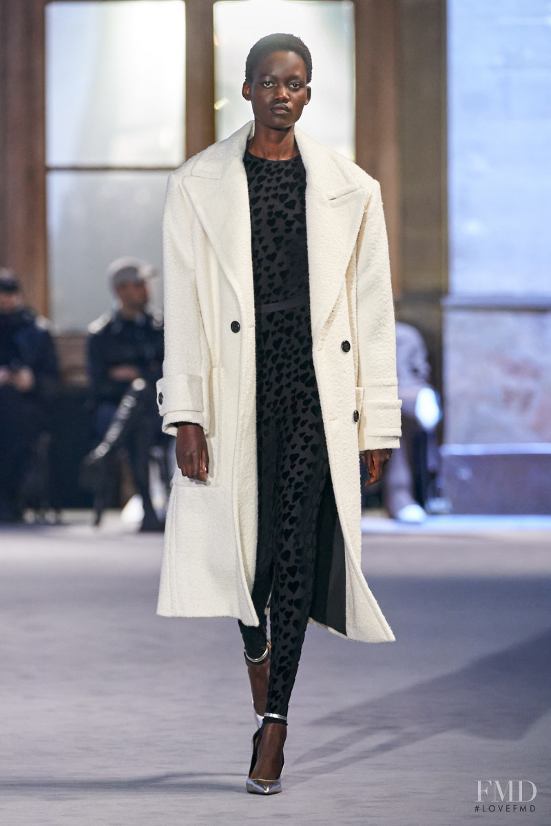 Caren Jepkemei featured in  the AMI Alexandre Mattiussi fashion show for Autumn/Winter 2022