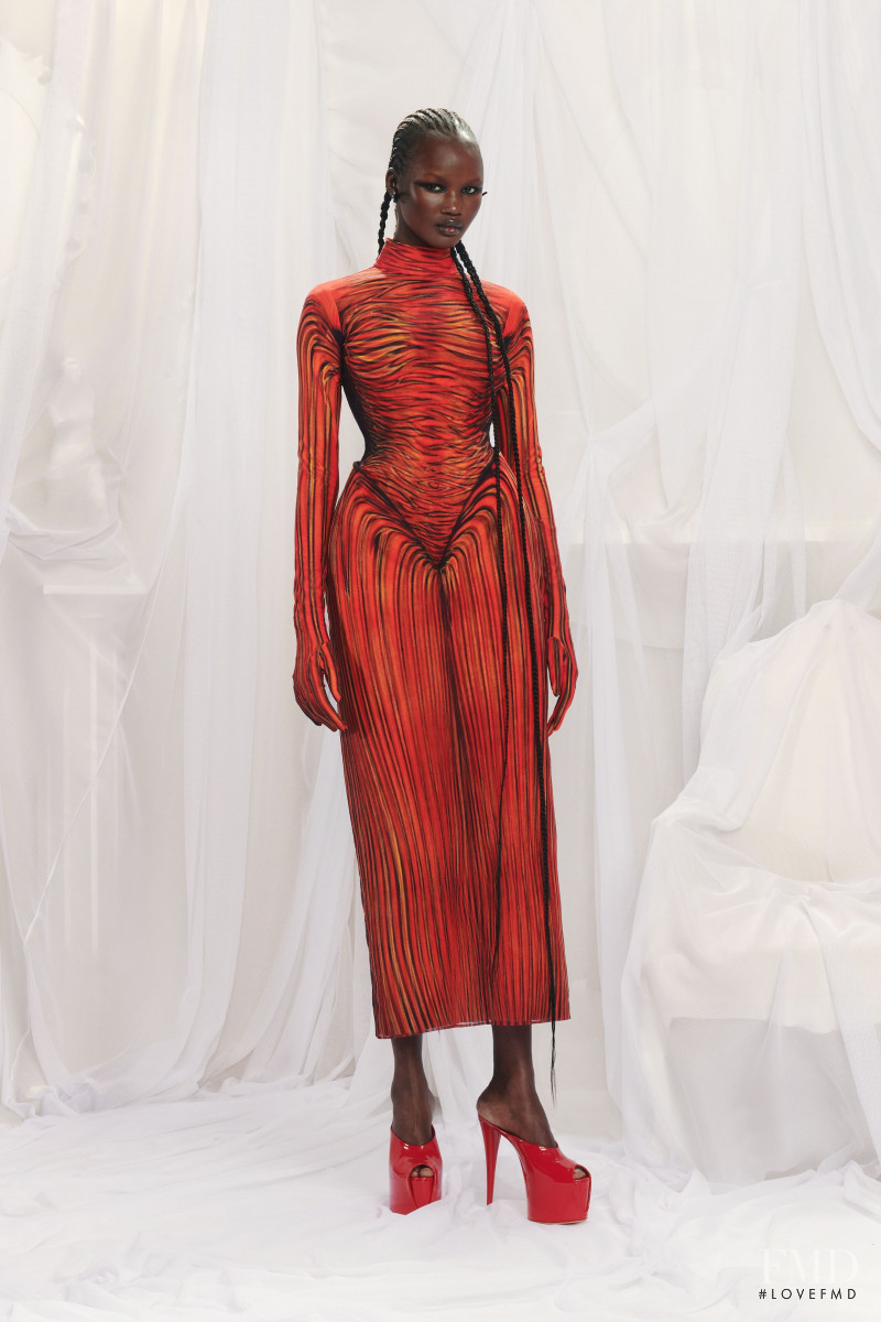 Abeny Nhial featured in  the Jean Paul Gaultier Haute Couture lookbook for Spring/Summer 2022