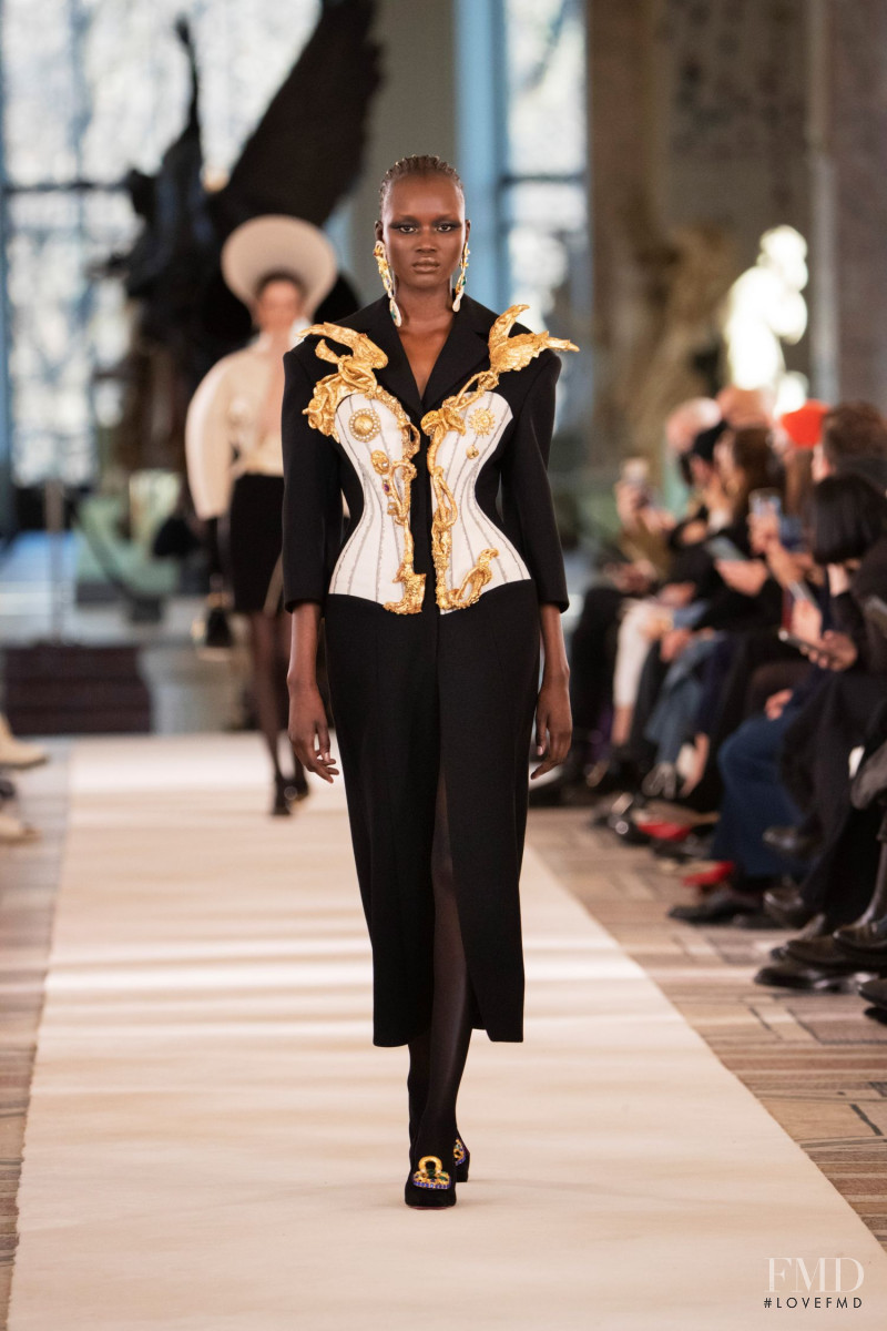 Abeny Nhial featured in  the Schiaparelli fashion show for Spring/Summer 2022