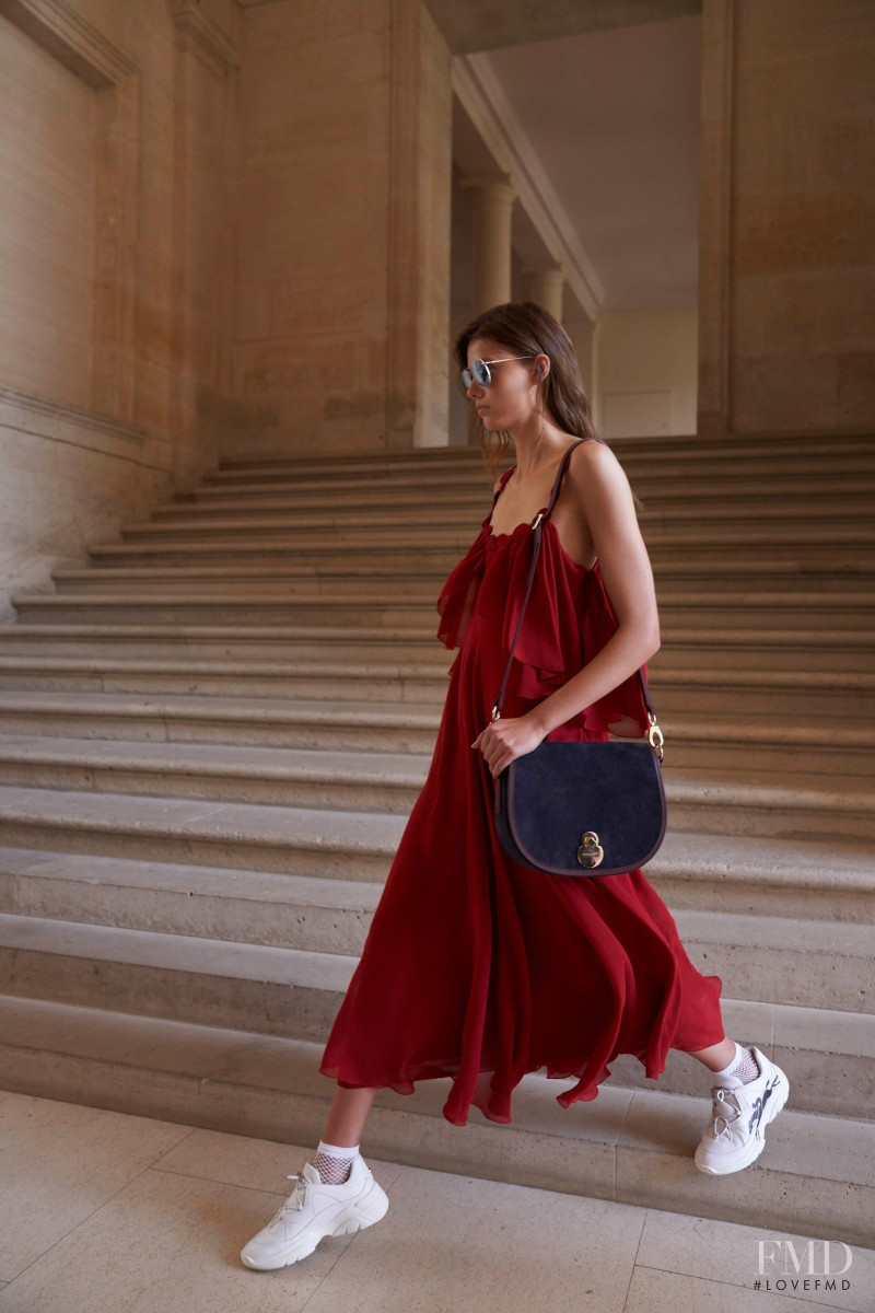 Mathilde Henning featured in  the Longchamp lookbook for Spring/Summer 2021