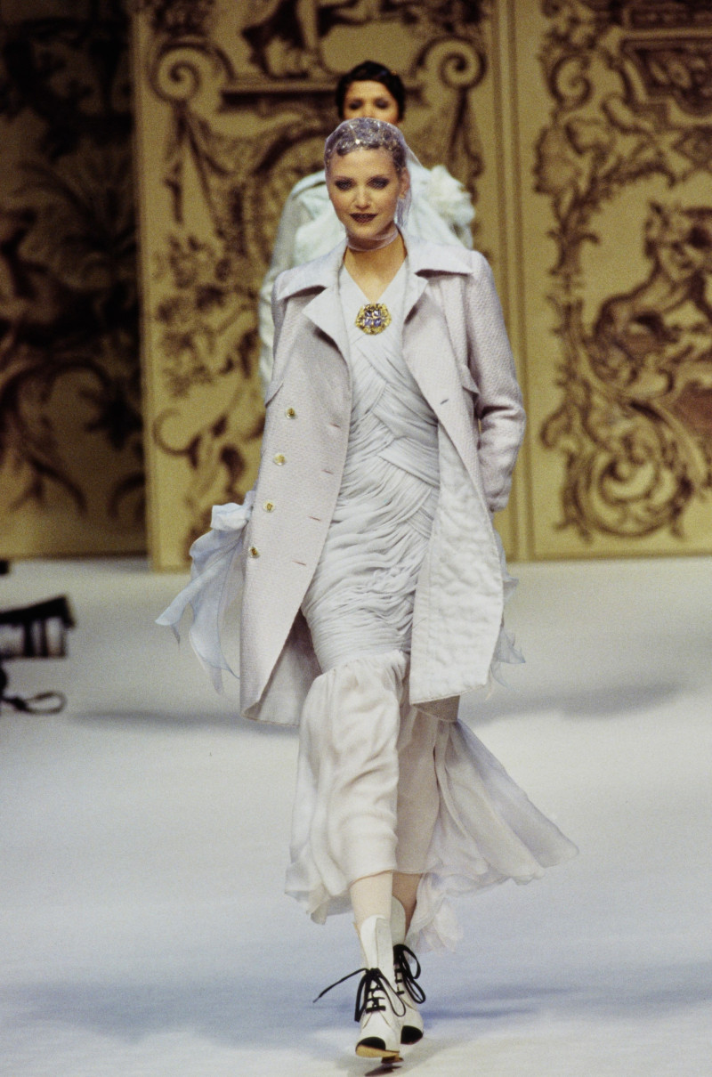 Nadja Auermann featured in  the Chanel Haute Couture fashion show for Spring/Summer 1993