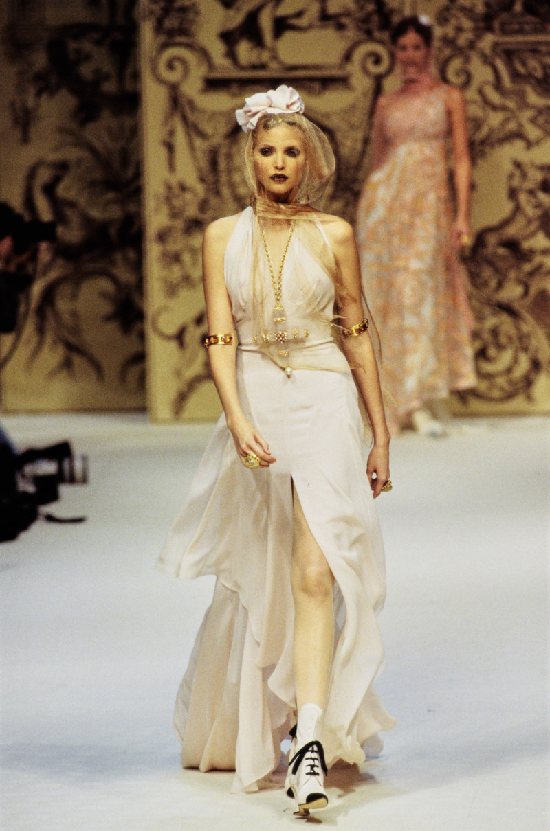 Nadja Auermann featured in  the Chanel Haute Couture fashion show for Spring/Summer 1993