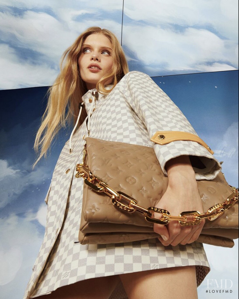 Ida Heiner featured in  the Louis Vuitton Nuages advertisement for Holiday 2021