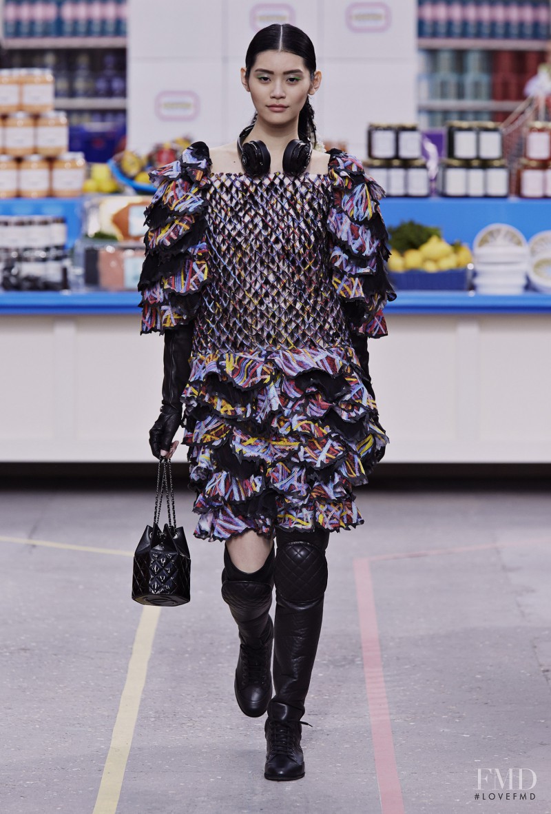 Ming Xi featured in  the Chanel fashion show for Autumn/Winter 2014
