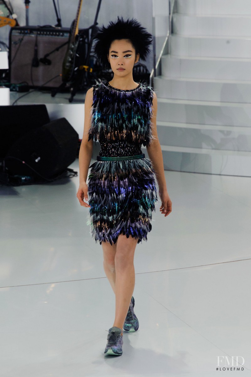 Ji Young Kwak featured in  the Chanel Haute Couture fashion show for Spring/Summer 2014