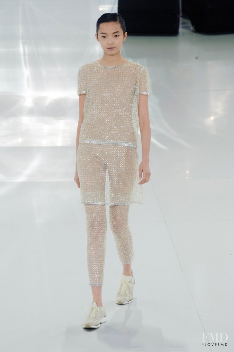 Xiao Wen Ju featured in  the Chanel Haute Couture fashion show for Spring/Summer 2014