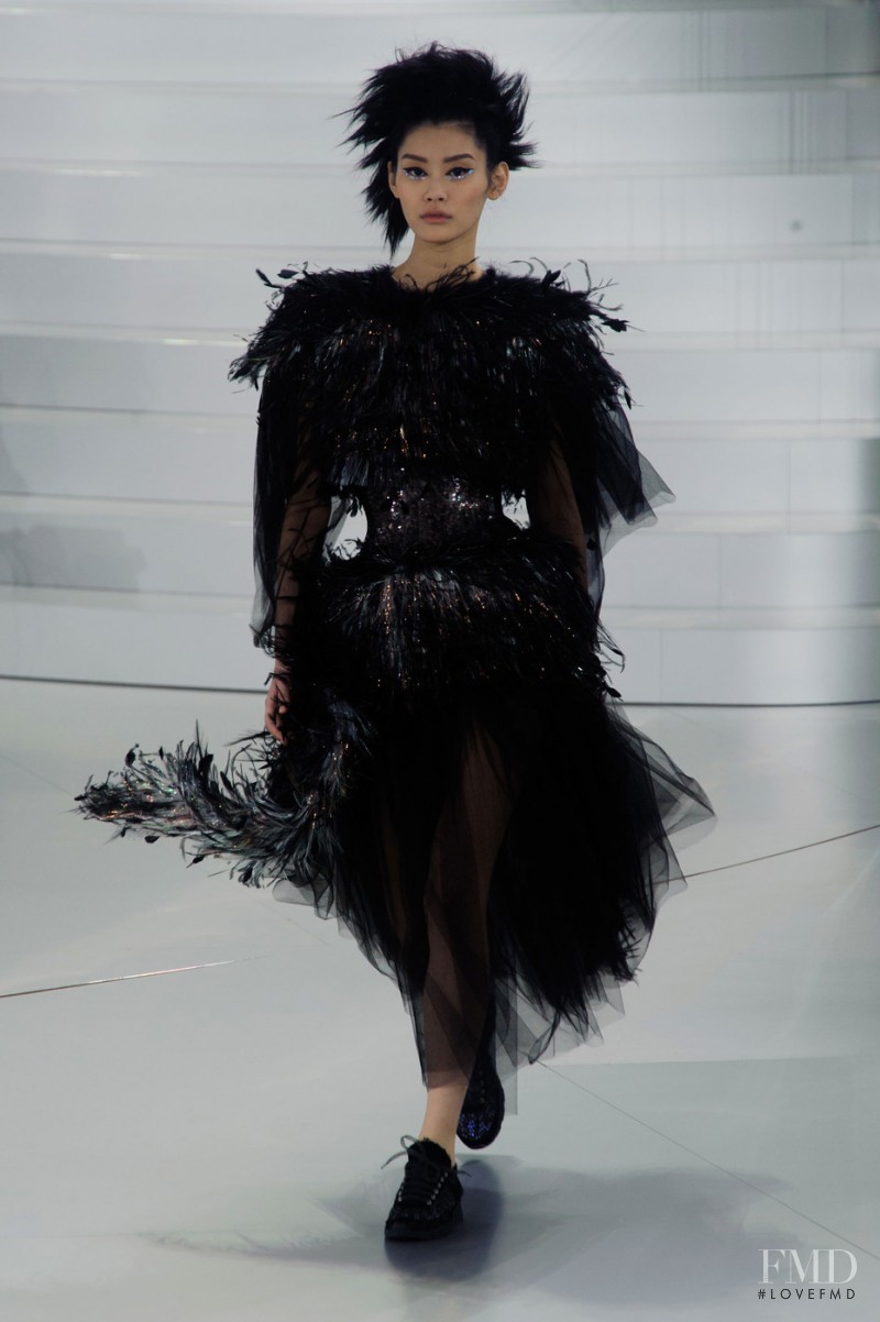 Ming Xi featured in  the Chanel Haute Couture fashion show for Spring/Summer 2014