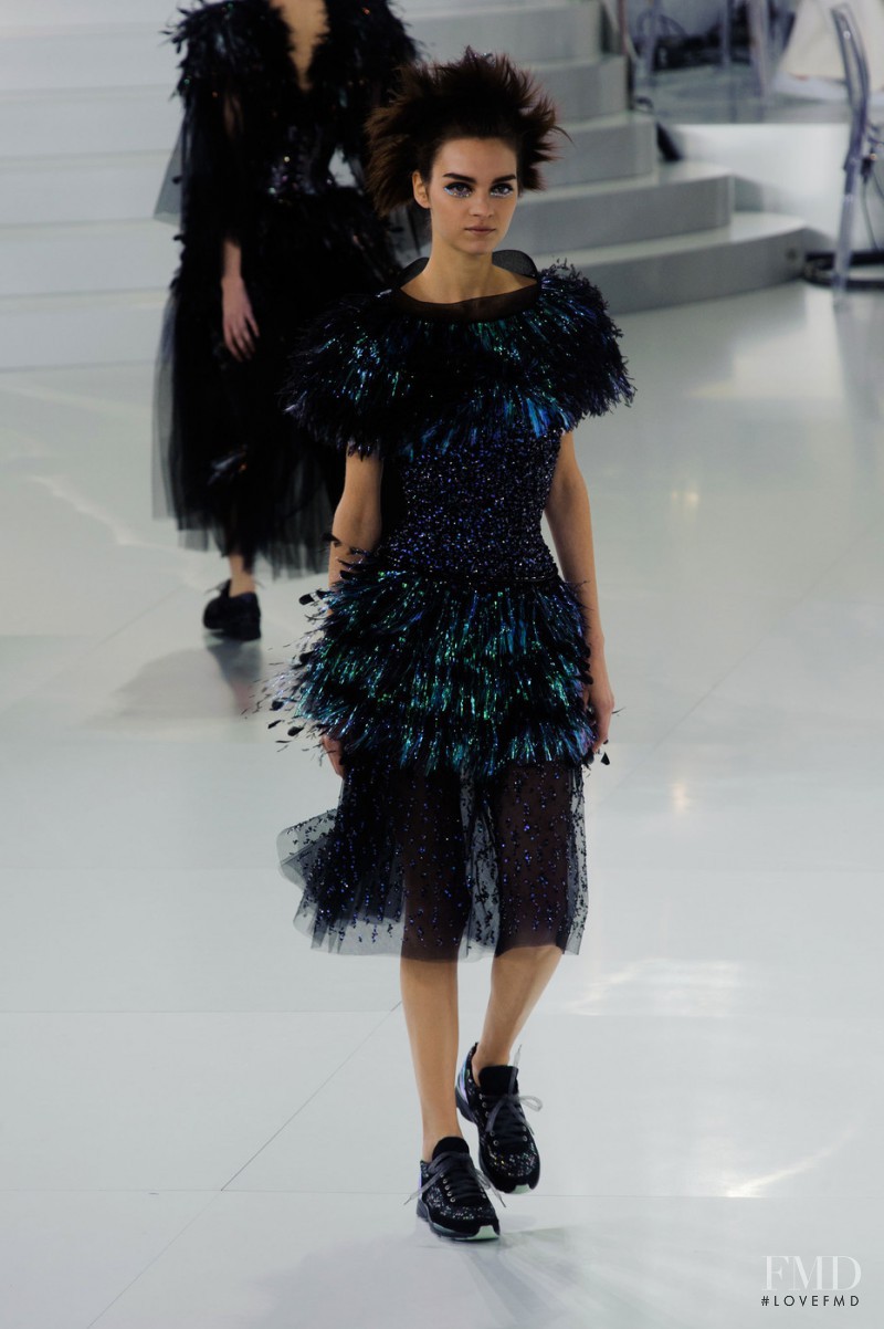 Magda Laguinge featured in  the Chanel Haute Couture fashion show for Spring/Summer 2014