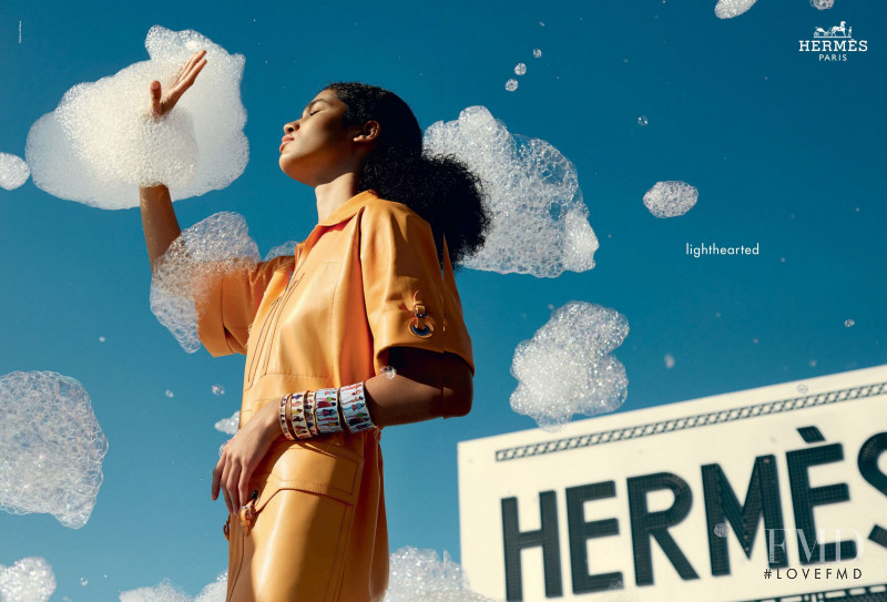 Raynara Negrine featured in  the Hermès advertisement for Spring/Summer 2022