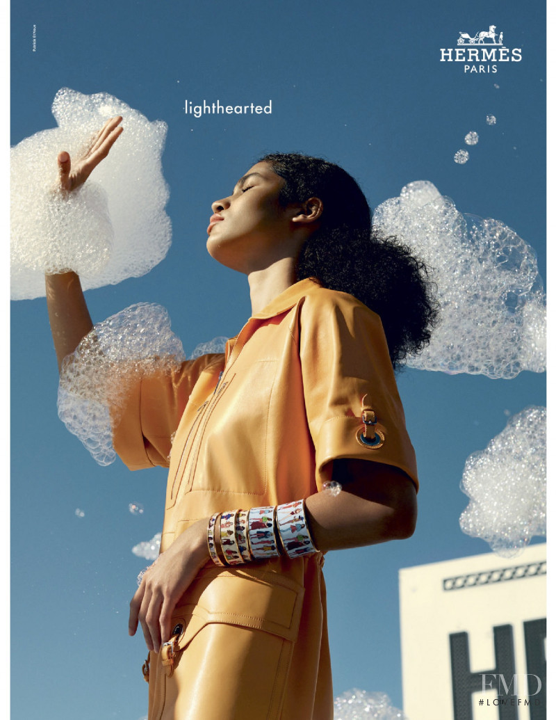 Raynara Negrine featured in  the Hermès advertisement for Spring/Summer 2022
