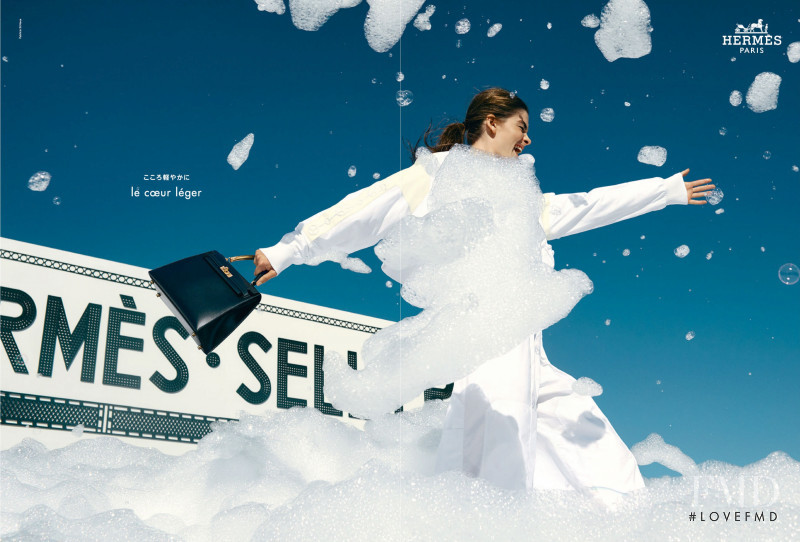 Merlijne Schorren featured in  the Hermès advertisement for Spring/Summer 2022
