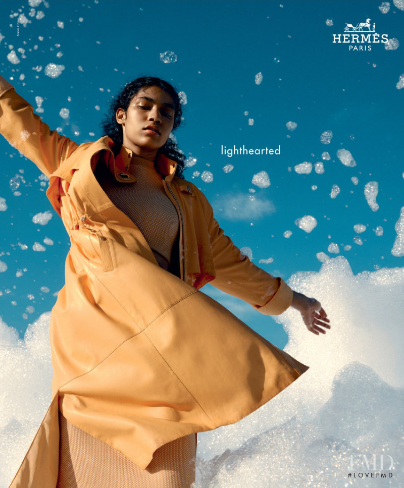 Raynara Negrine featured in  the Hermès advertisement for Spring/Summer 2022