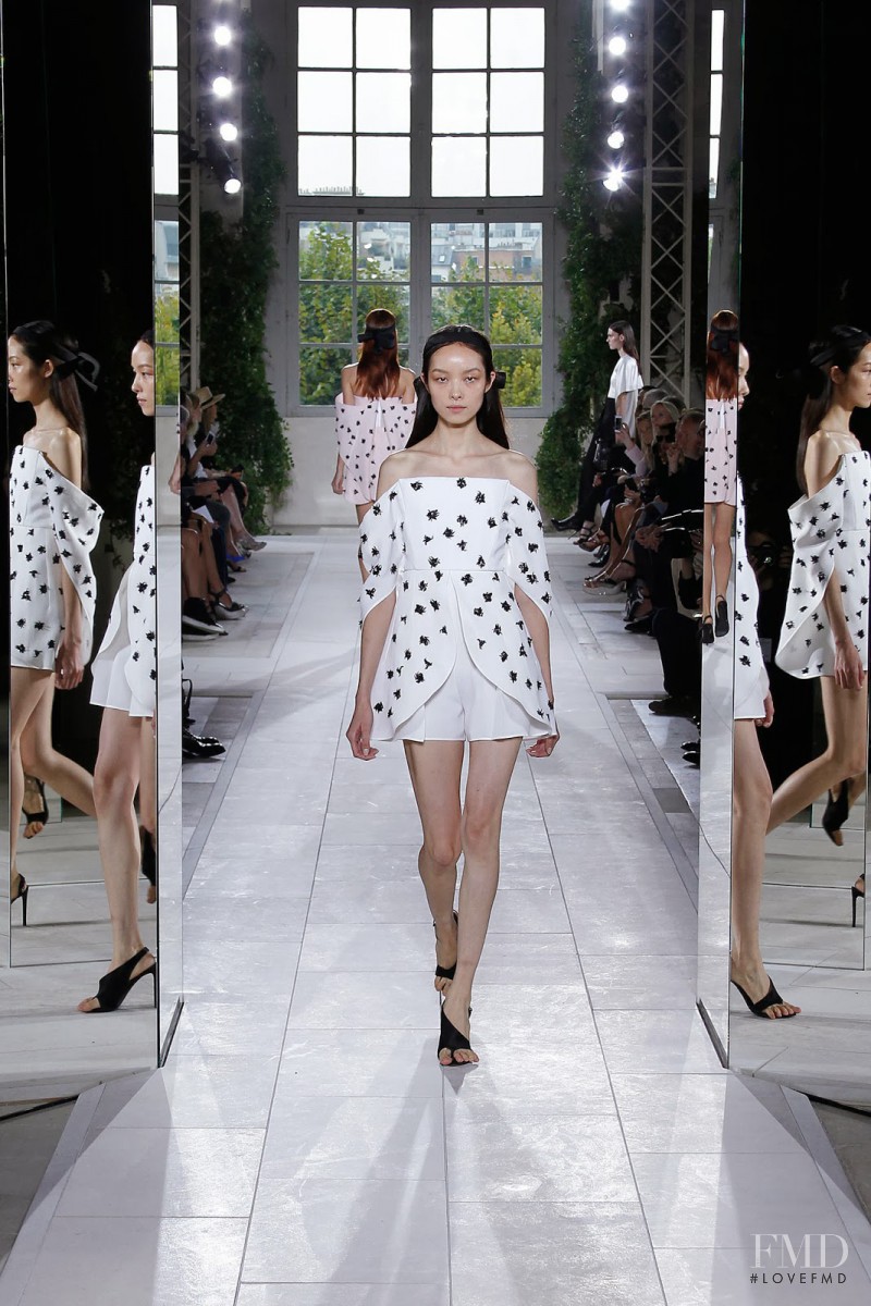 Fei Fei Sun featured in  the Balenciaga fashion show for Spring/Summer 2014