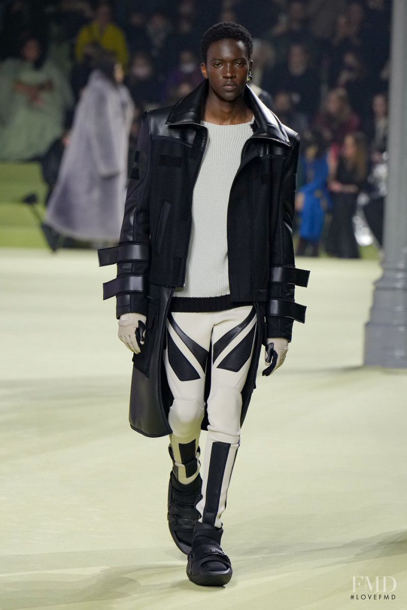 Limamu Mbaye featured in  the Balmain fashion show for Autumn/Winter 2022