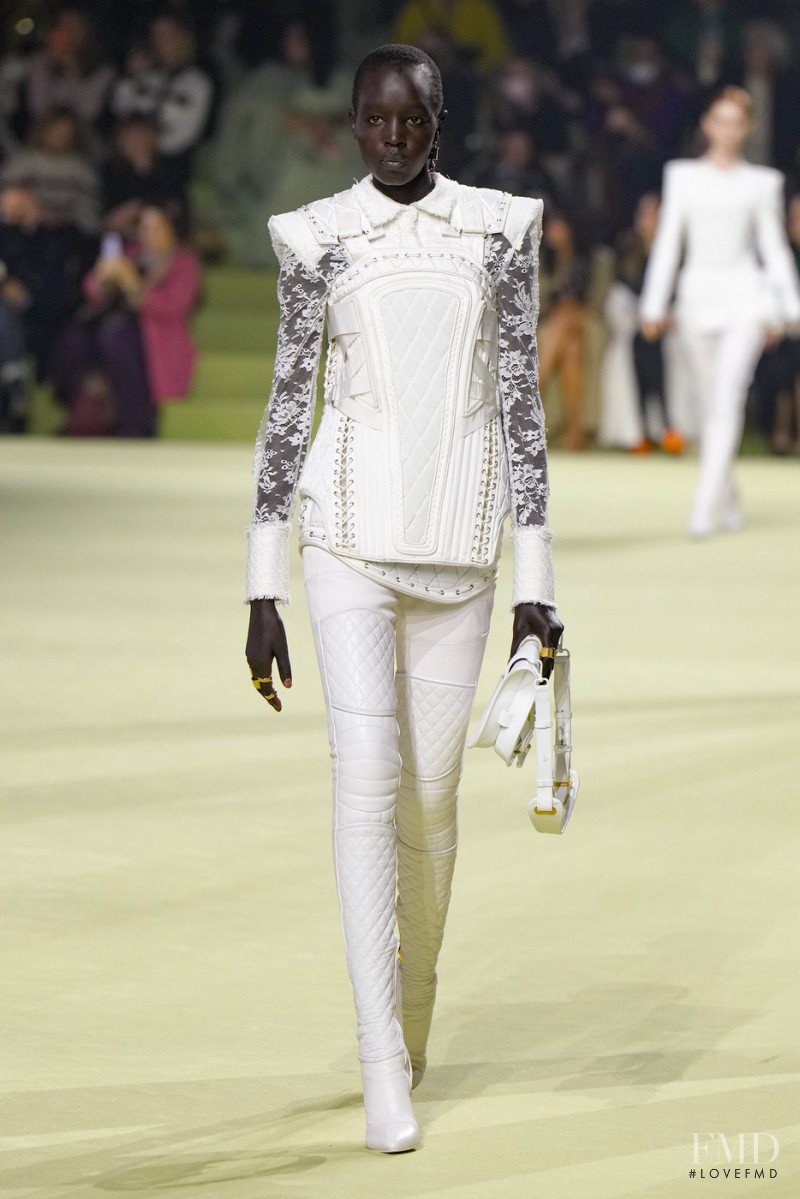 Akuol Deng Atem featured in  the Balmain fashion show for Autumn/Winter 2022