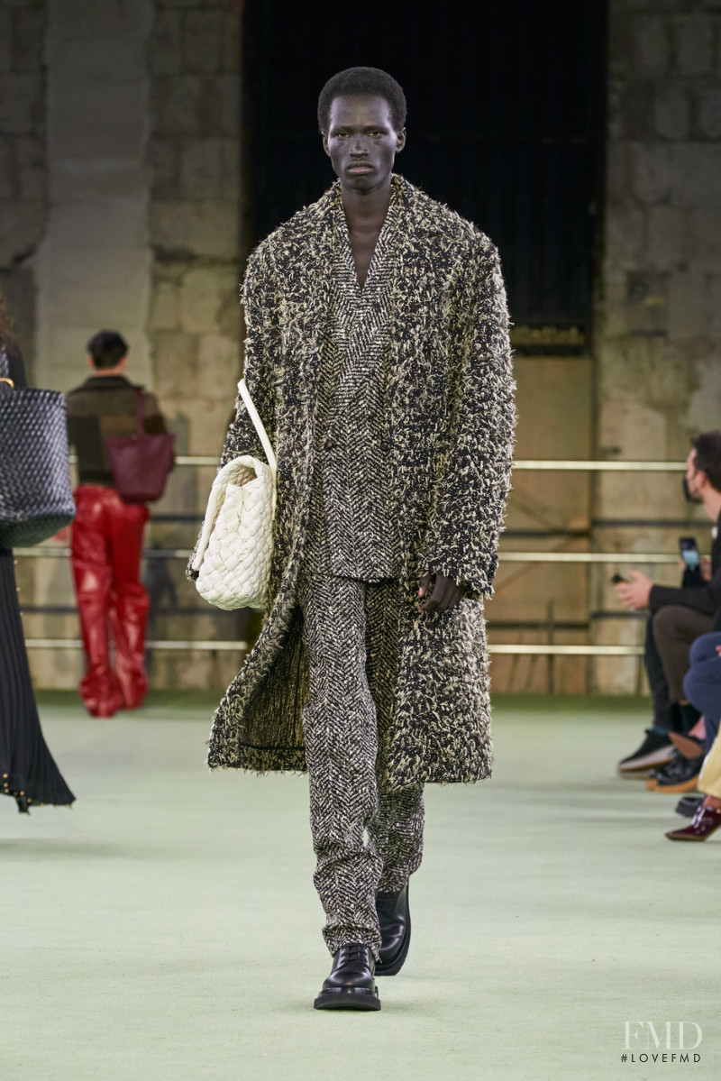 Mamuor Awak Majeng featured in  the Bottega Veneta fashion show for Autumn/Winter 2022