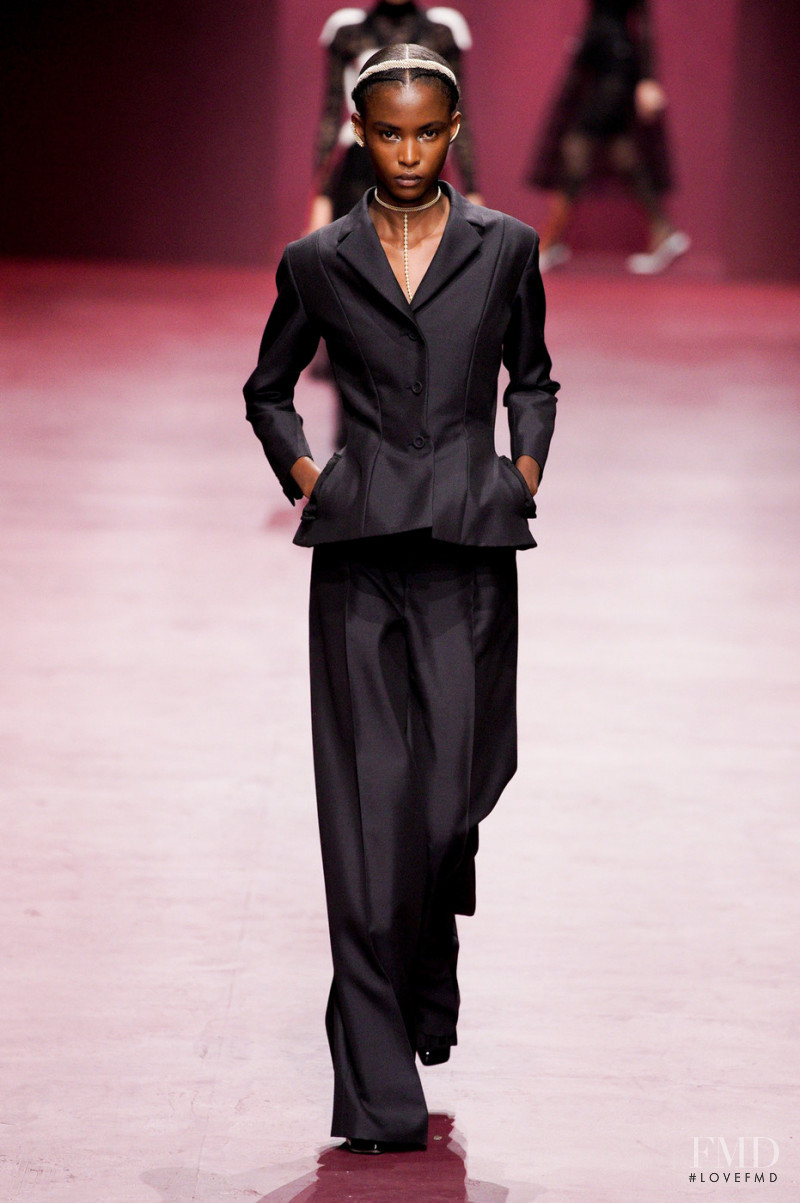 Christie Munezero featured in  the Christian Dior fashion show for Autumn/Winter 2022