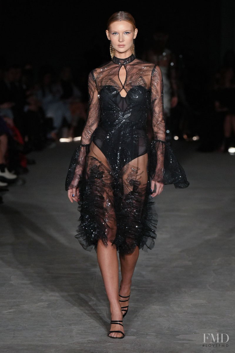 Yana Trufanova featured in  the Christian Siriano fashion show for Autumn/Winter 2022