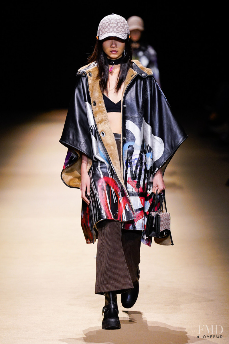 Kaigin Jean Yong featured in  the Coach fashion show for Autumn/Winter 2022