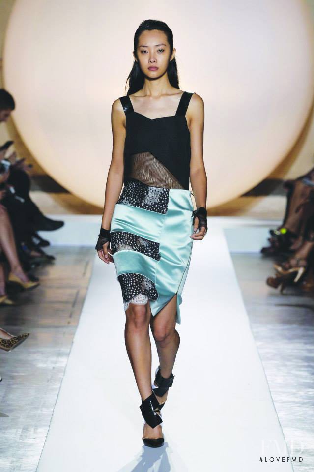 Ji Young Kwak featured in  the Roland Mouret fashion show for Spring/Summer 2014