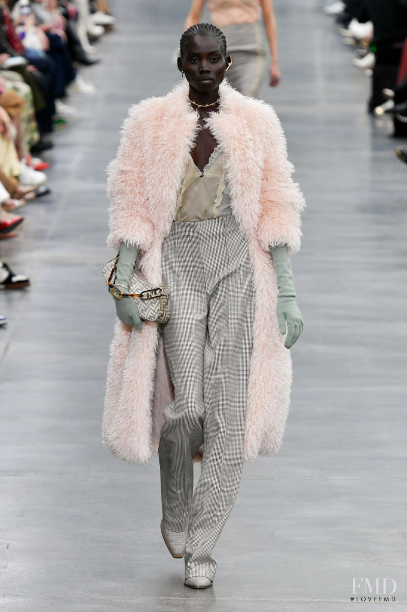 Nyanderi Deng featured in  the Fendi fashion show for Autumn/Winter 2022