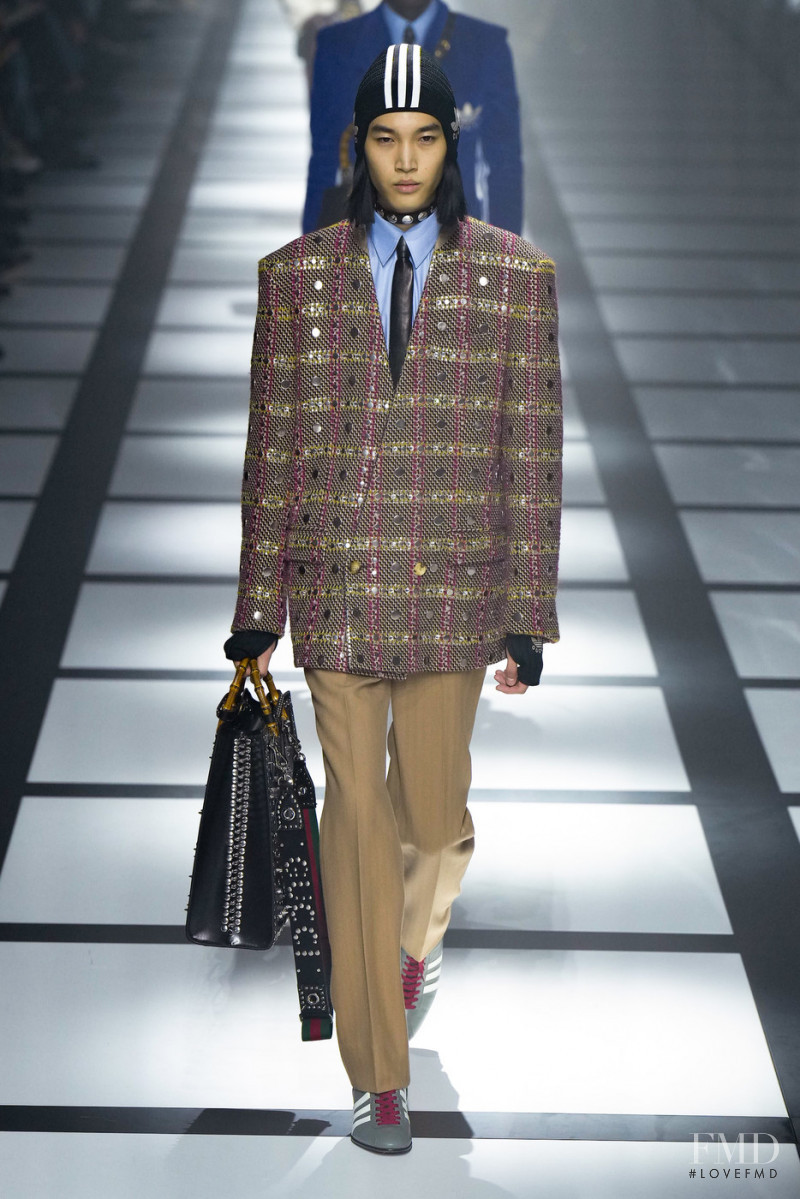 Zhicheng Han featured in  the Gucci fashion show for Autumn/Winter 2022