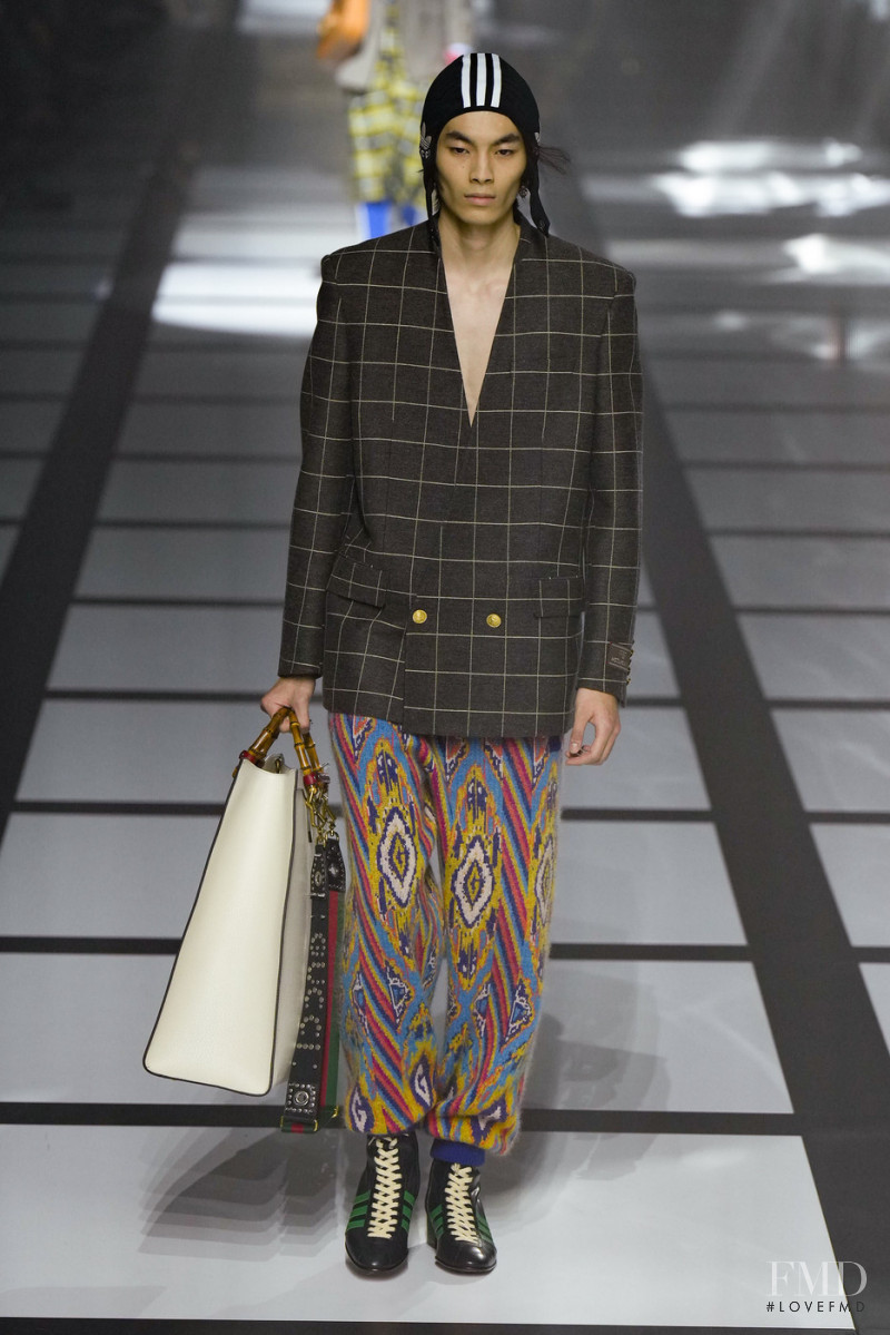 Kuya Okai featured in  the Gucci fashion show for Autumn/Winter 2022