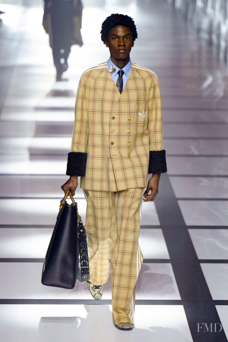 Odinaka Ekezie featured in  the Gucci fashion show for Autumn/Winter 2022