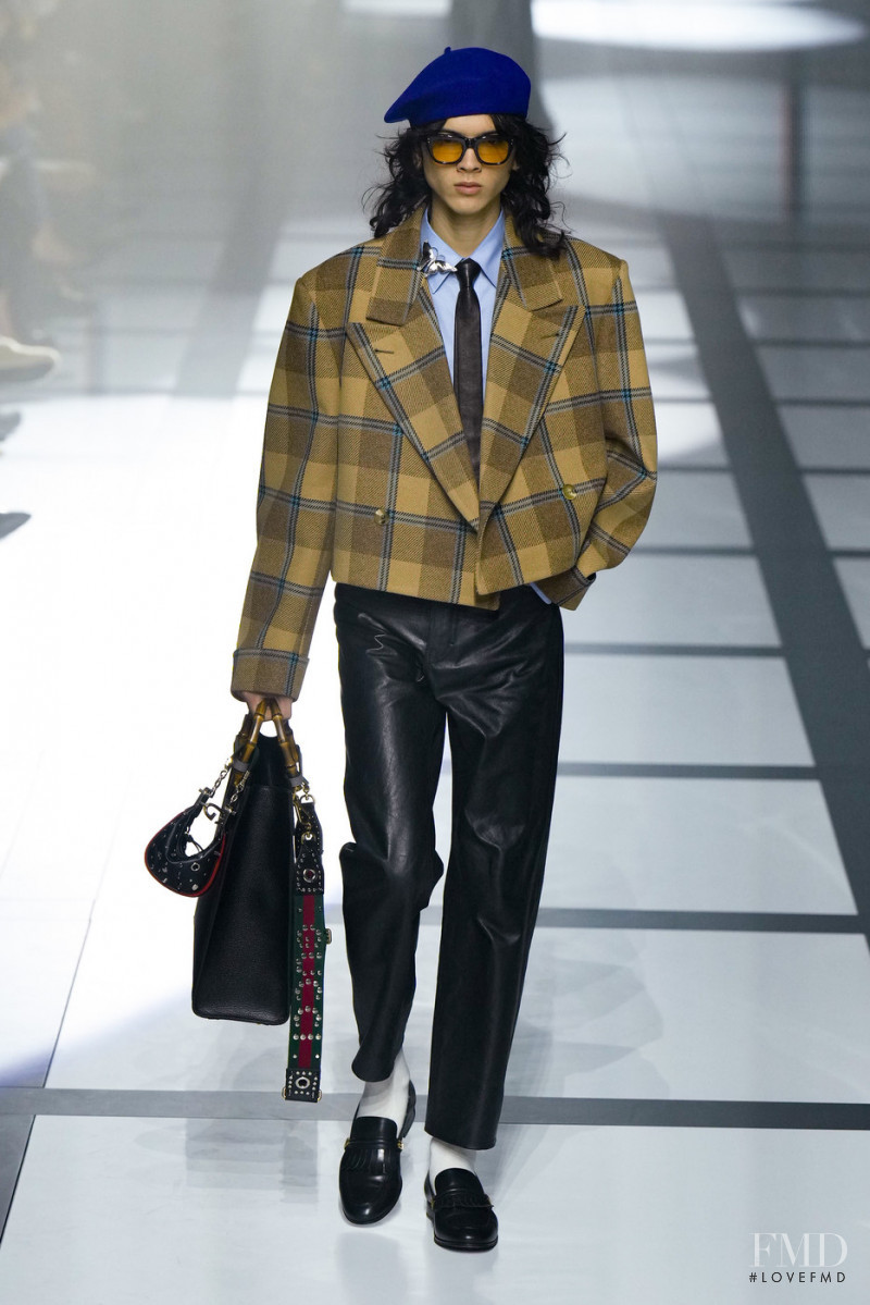 Ryu Aguilar featured in  the Gucci fashion show for Autumn/Winter 2022