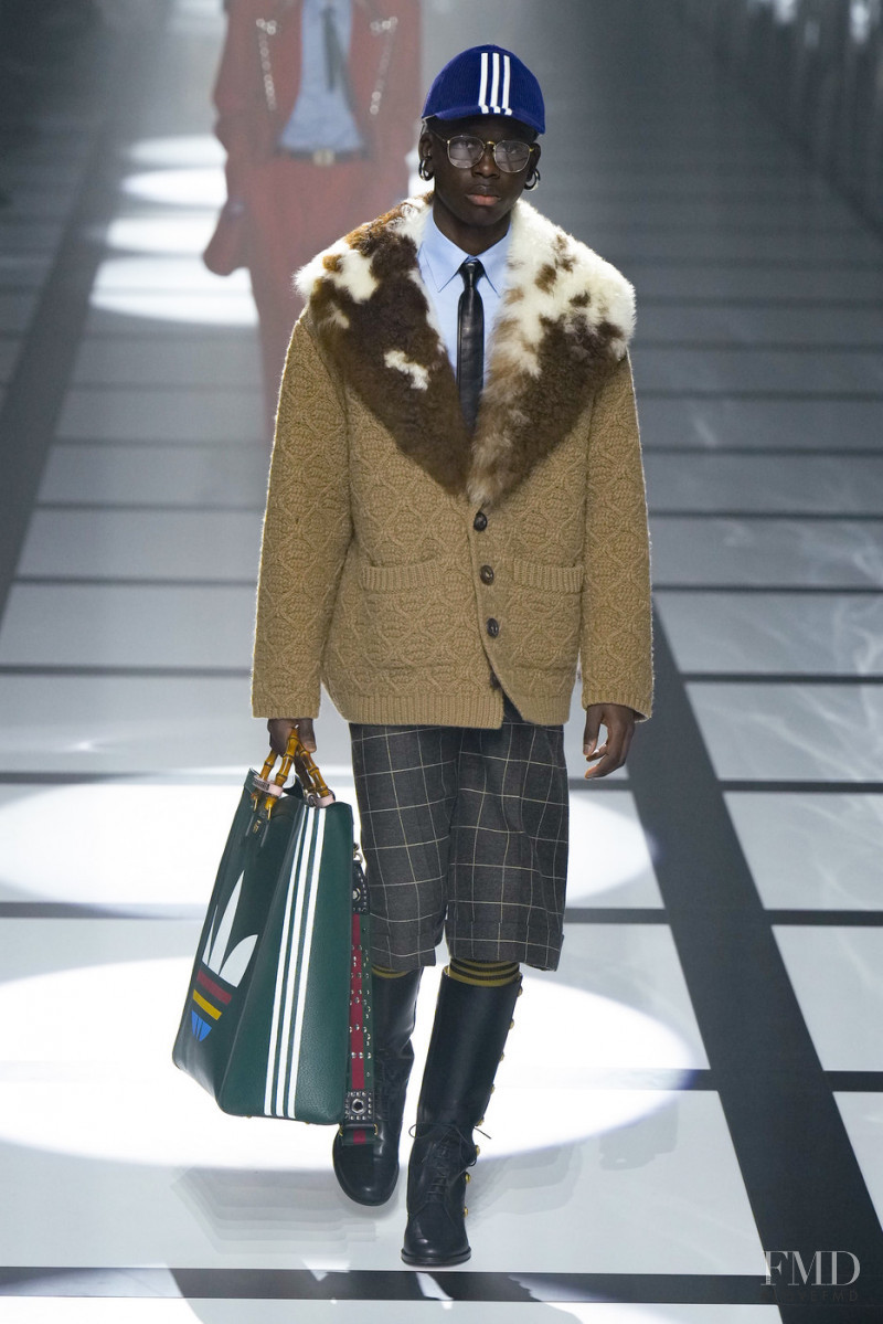 Ibrahima Kone featured in  the Gucci fashion show for Autumn/Winter 2022