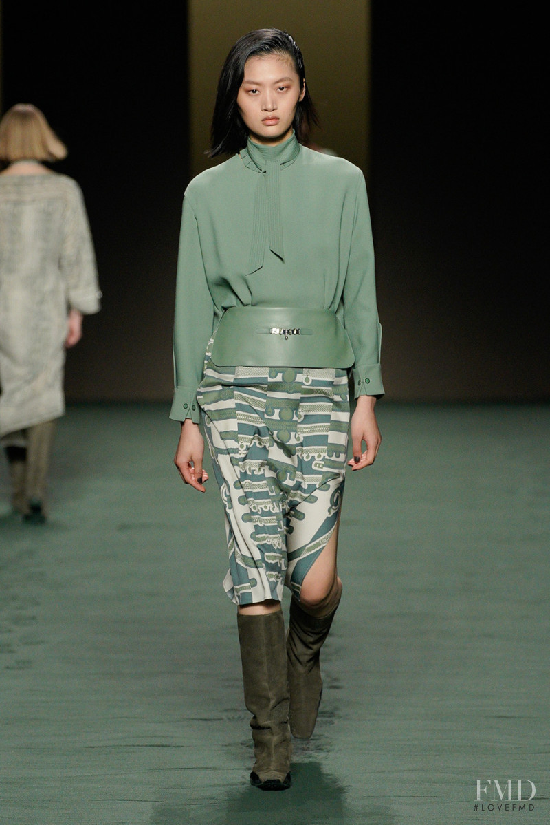 Yilan Hua featured in  the Hermès fashion show for Autumn/Winter 2022