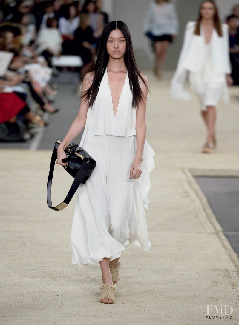 Tian Yi featured in  the Chloe fashion show for Spring/Summer 2014