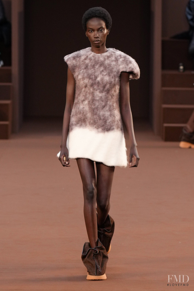 Anok Yai featured in  the Loewe fashion show for Autumn/Winter 2022