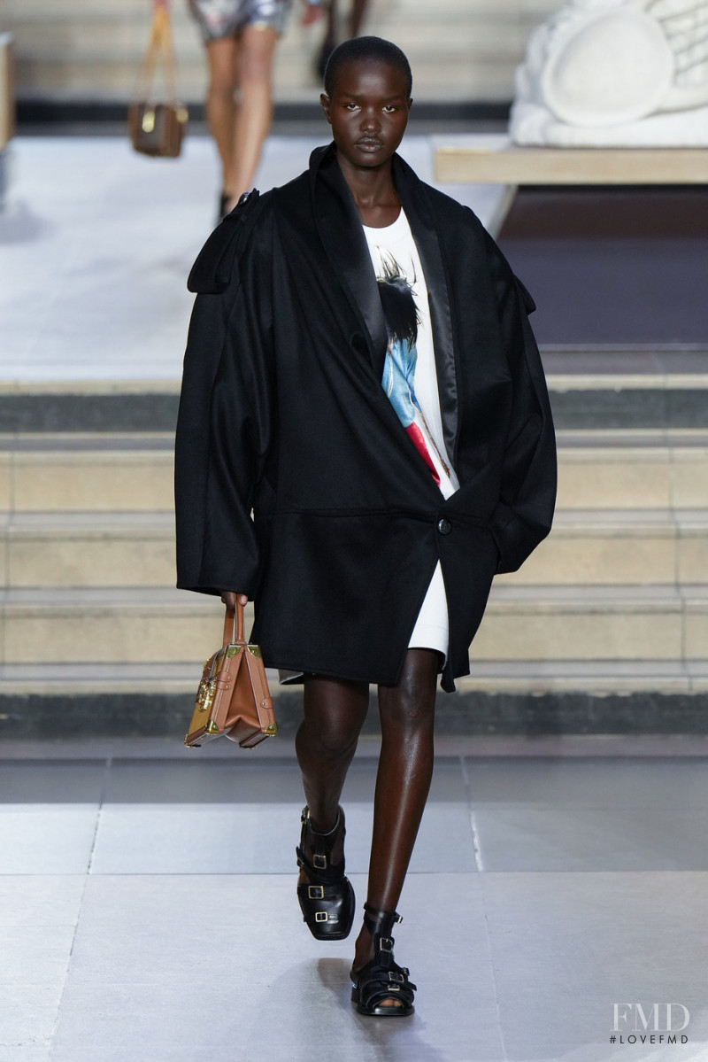 Akon Changkou featured in  the Louis Vuitton fashion show for Autumn/Winter 2022