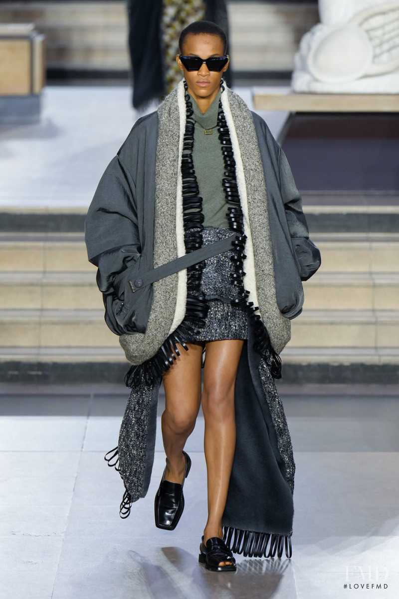 Omowunmi Shodeko featured in  the Louis Vuitton fashion show for Autumn/Winter 2022