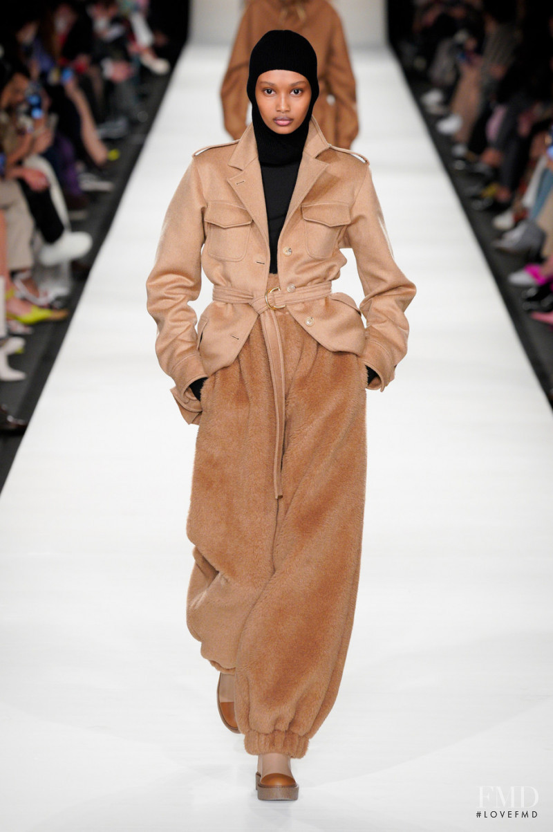 Ugbad Abdi featured in  the Max Mara fashion show for Autumn/Winter 2022