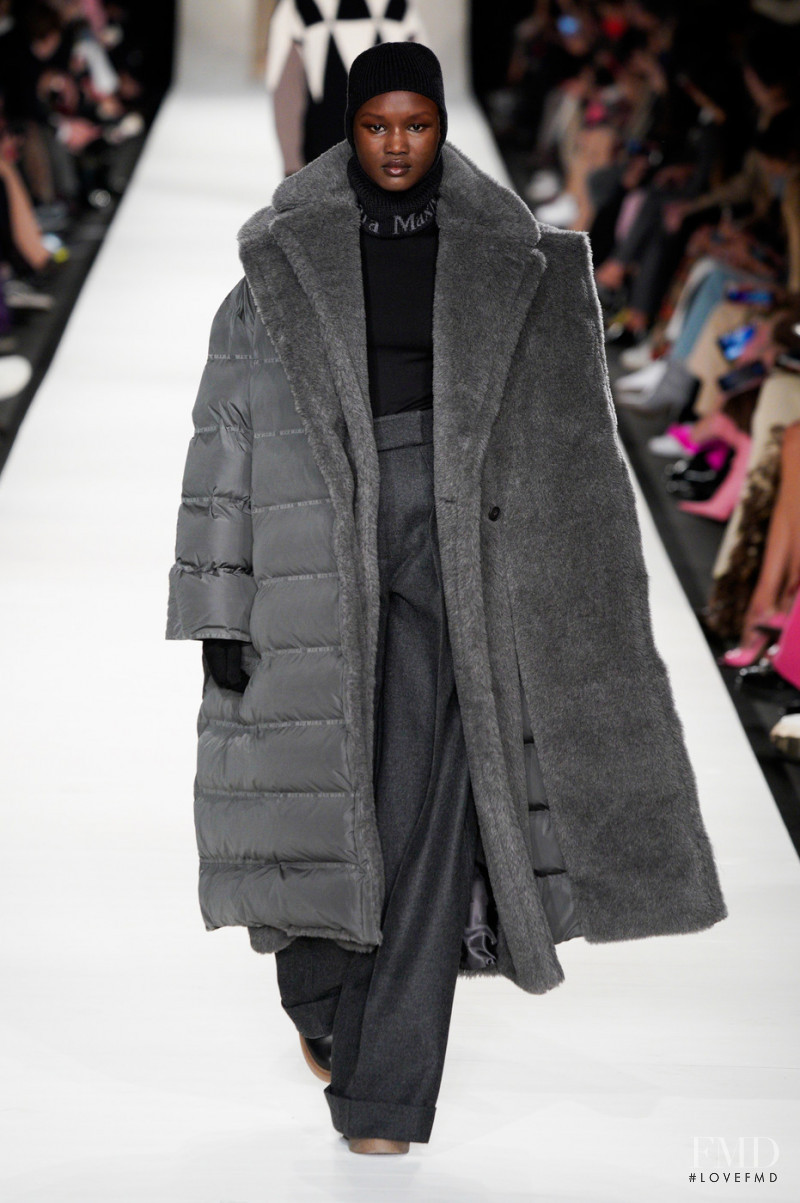 Abeny Nhial featured in  the Max Mara fashion show for Autumn/Winter 2022