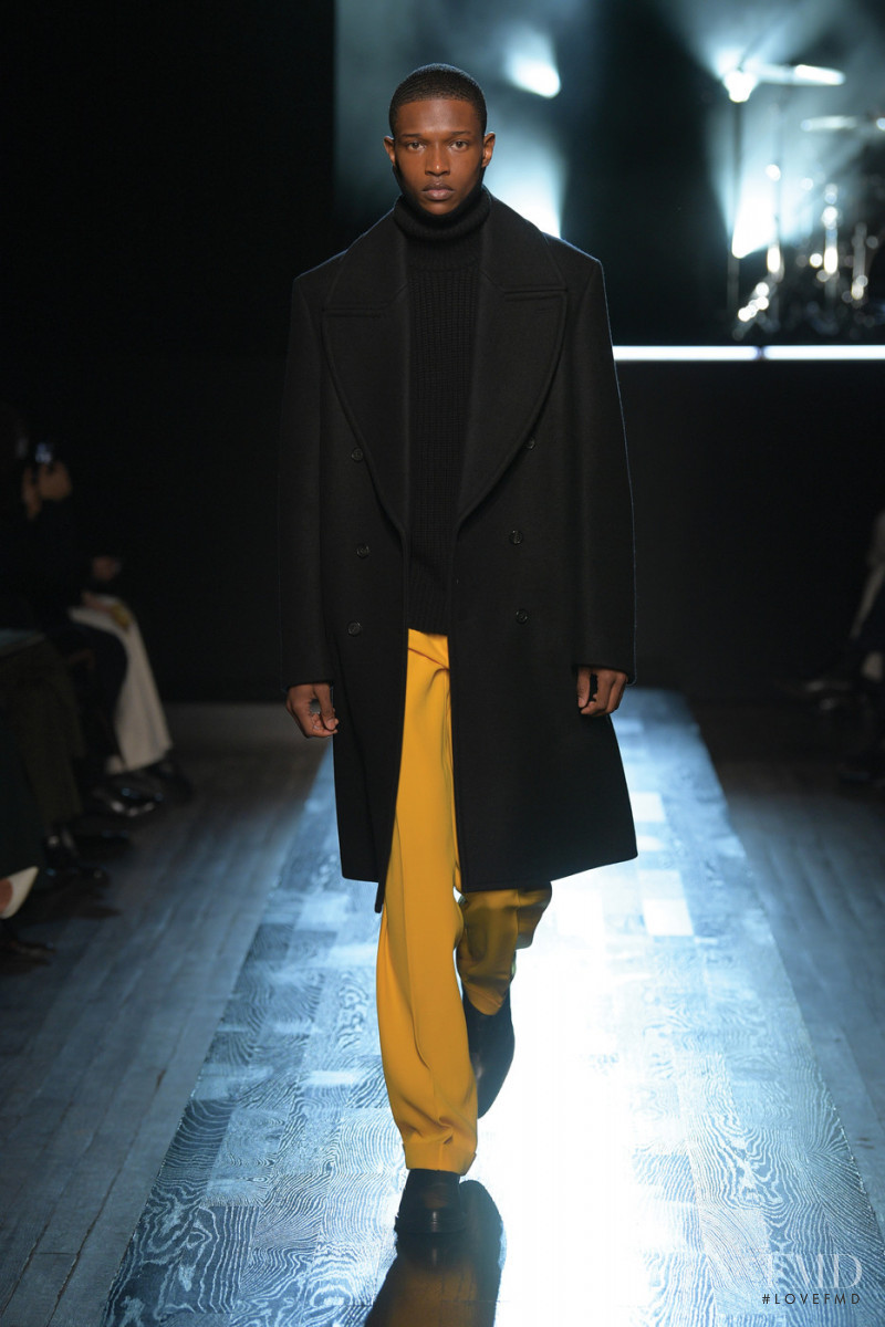 Malik Anderson featured in  the Michael Kors Collection fashion show for Autumn/Winter 2022