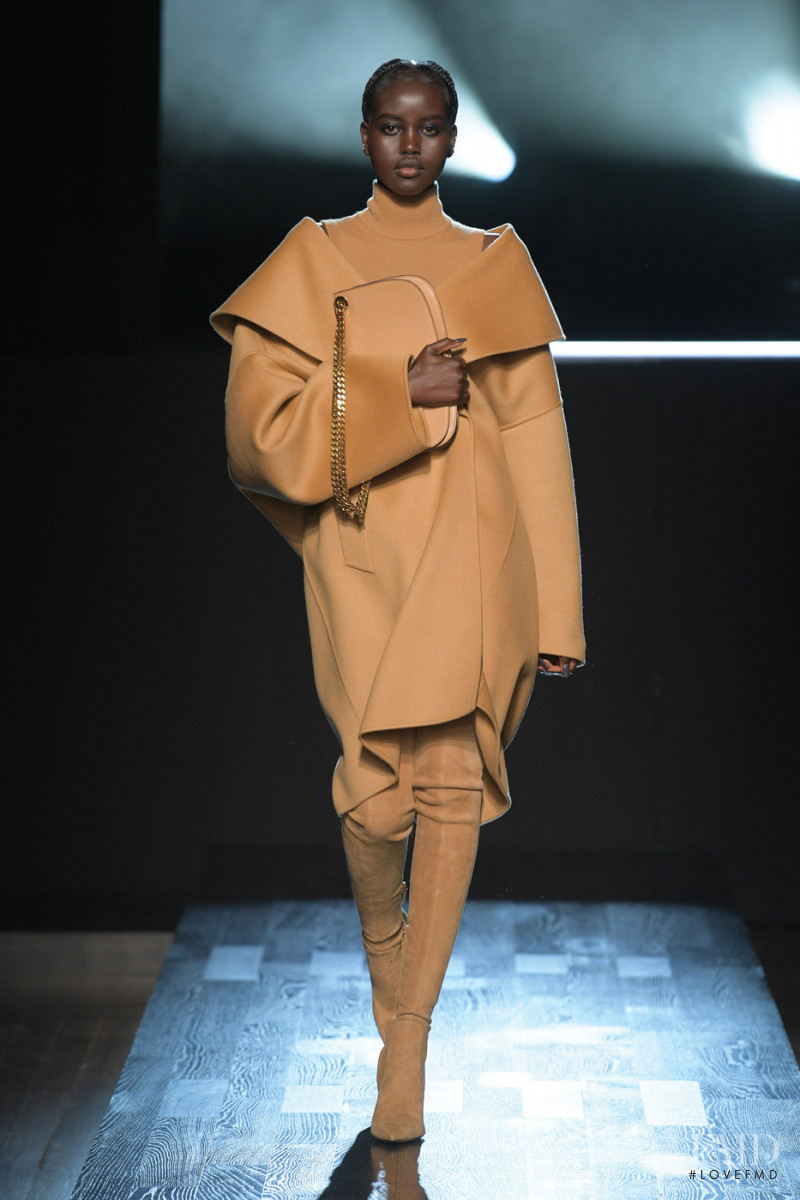 Adut Akech Bior featured in  the Michael Kors Collection fashion show for Autumn/Winter 2022