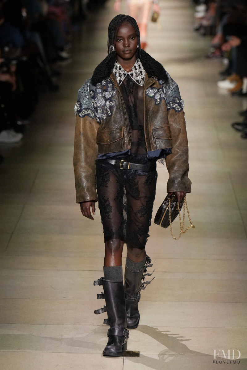 Angair Biong featured in  the Miu Miu fashion show for Autumn/Winter 2022