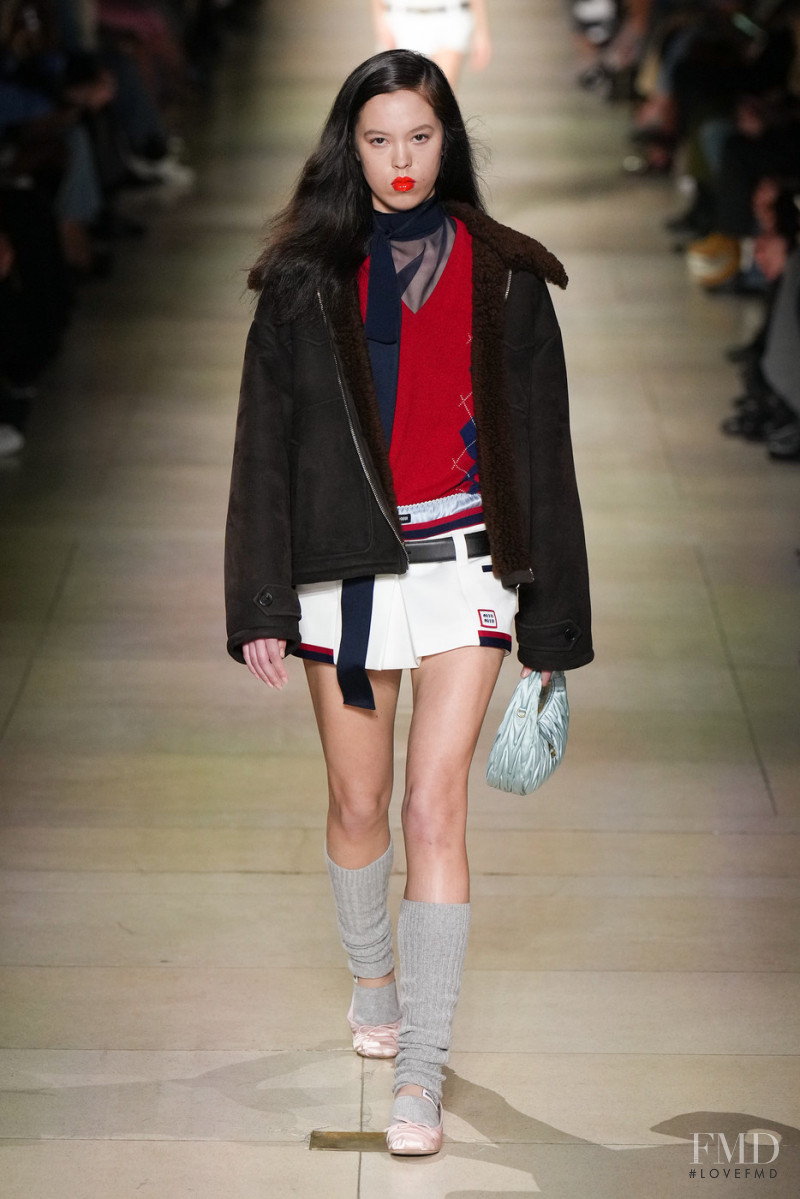 Mica Kendall featured in  the Miu Miu fashion show for Autumn/Winter 2022