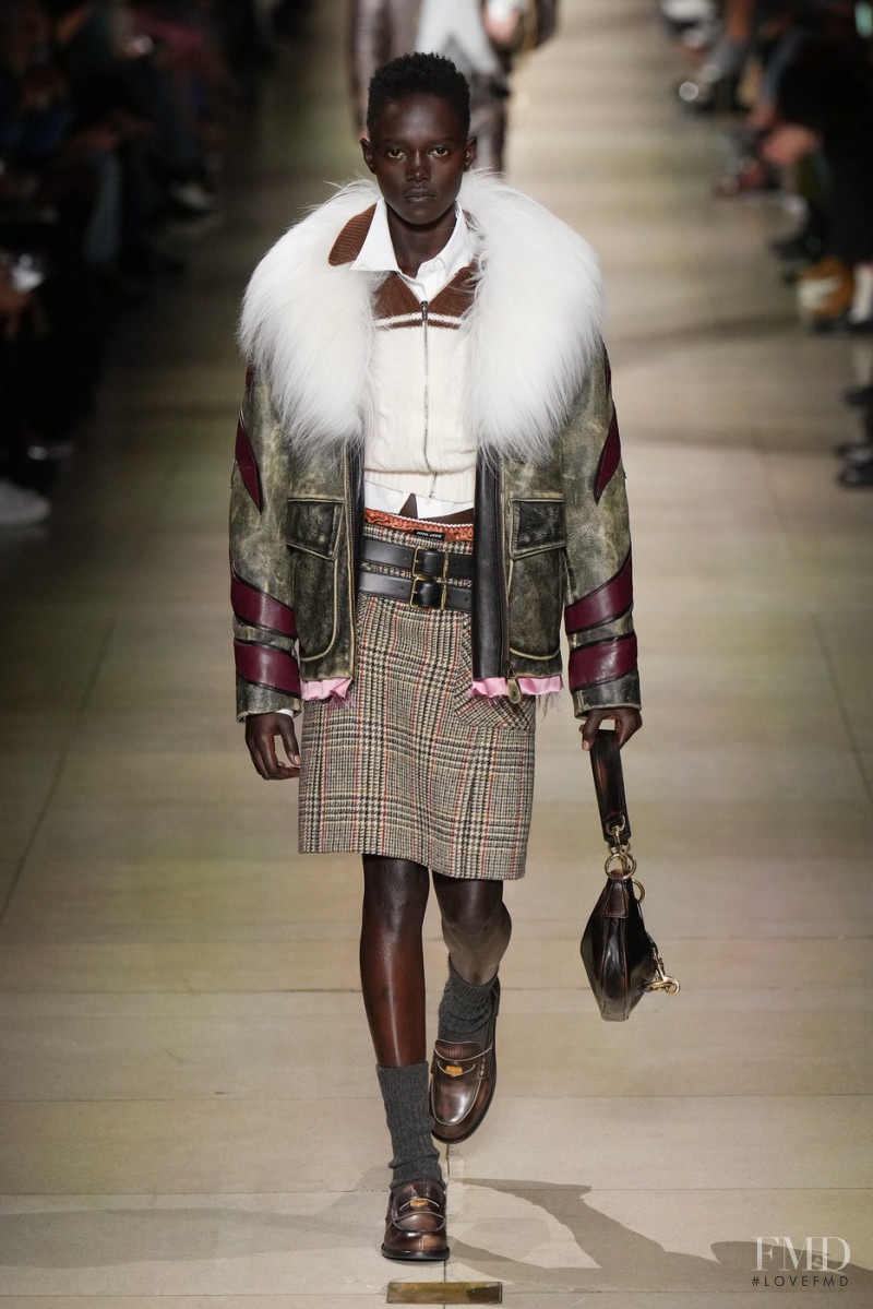 Alaato Jazyper featured in  the Miu Miu fashion show for Autumn/Winter 2022