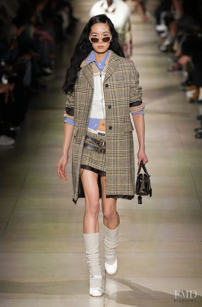 Suzune Oda featured in  the Miu Miu fashion show for Autumn/Winter 2022