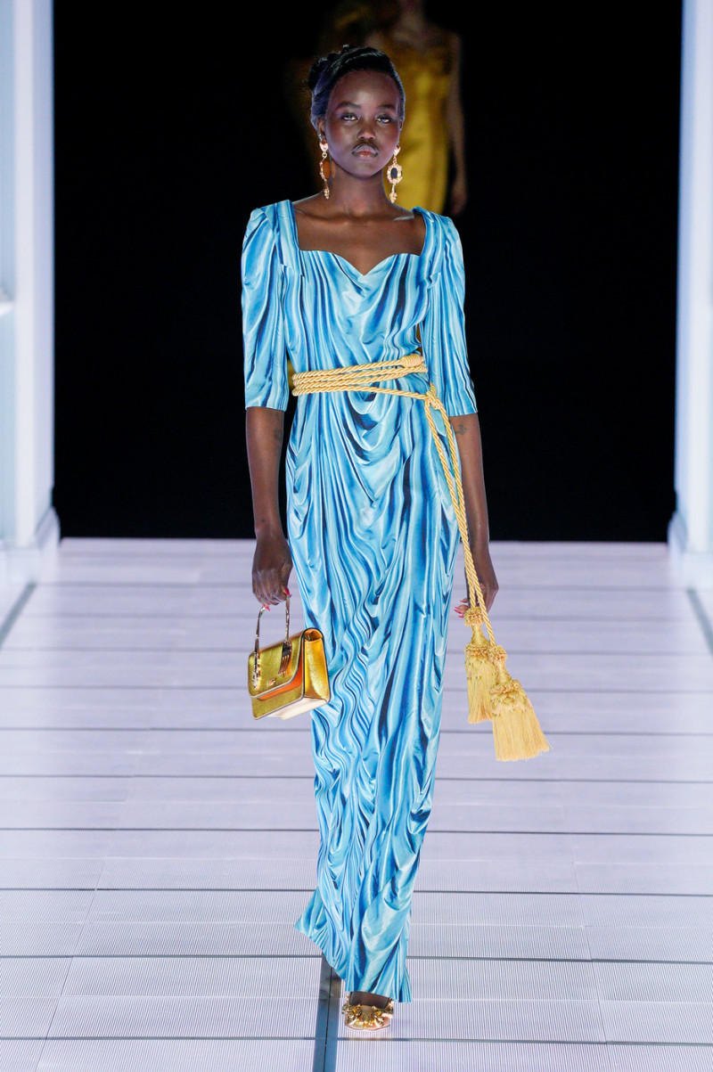 Adut Akech Bior featured in  the Moschino fashion show for Autumn/Winter 2022