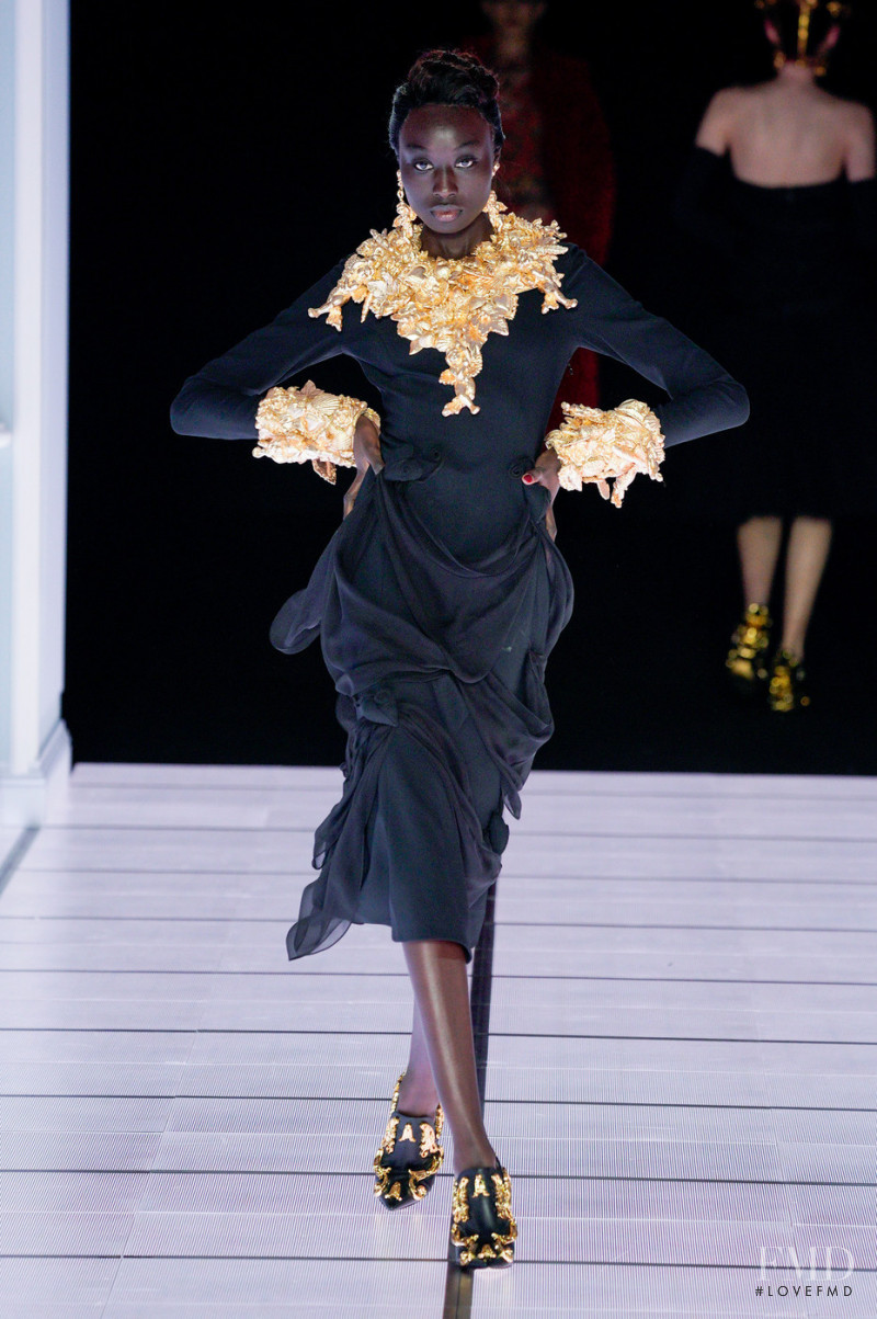 Nyagua Ruea featured in  the Moschino fashion show for Autumn/Winter 2022