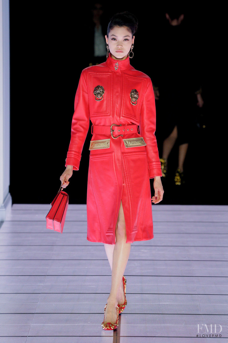 Mika Schneider featured in  the Moschino fashion show for Autumn/Winter 2022