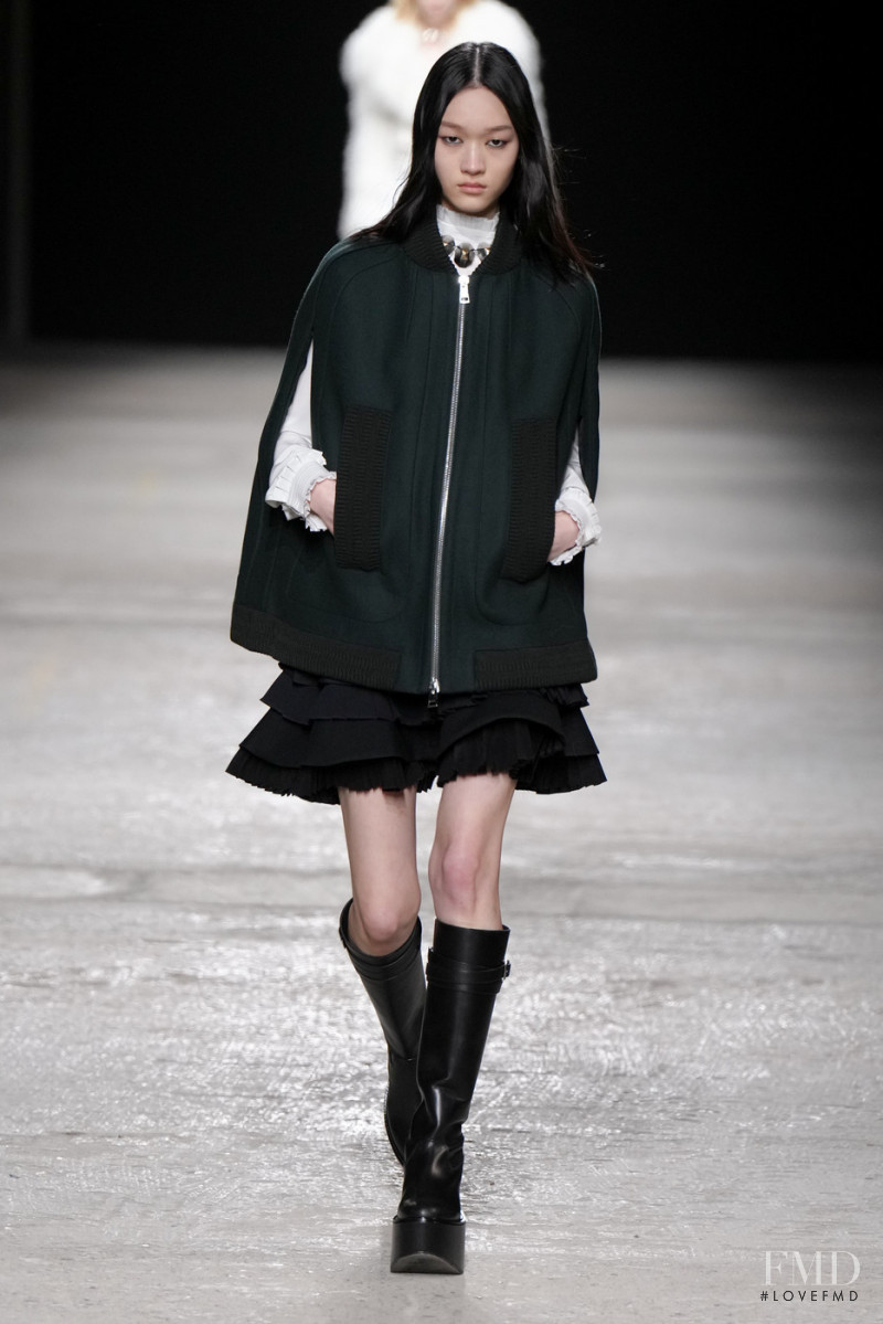 Chloe Oh featured in  the Ports 1961 fashion show for Autumn/Winter 2022